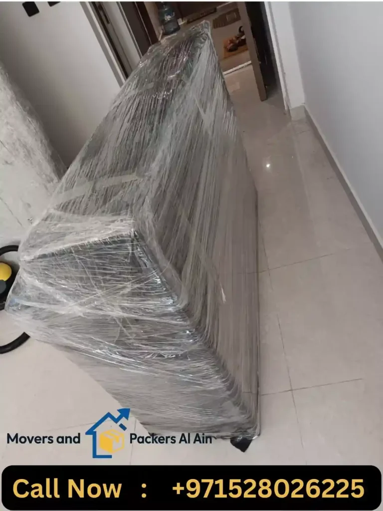 Wooden storage cabinet wrapped before relocation.